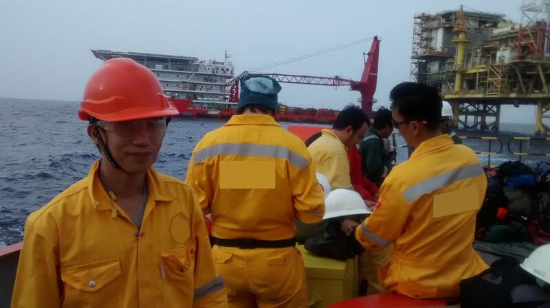 Project Professional Career Related To The Author in a Newcomer Orange Helmet About to Board the Floating Work Barge